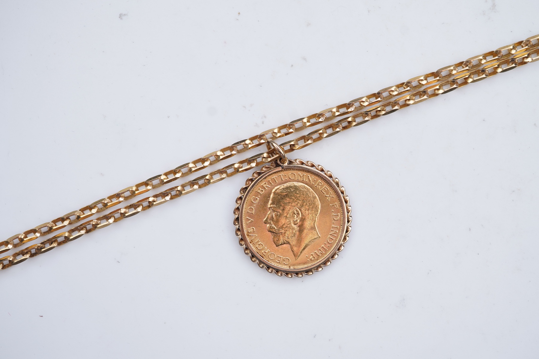 A George V sovereign coin pendant necklace